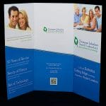 The outside of the Thompson Suburban Dental brochure features the logo we designed in 2012.